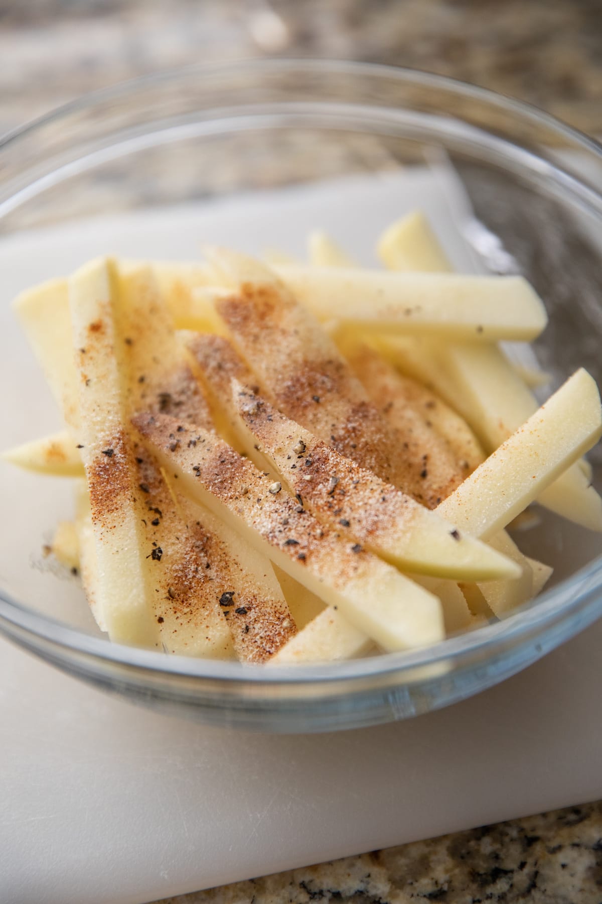 fries in bowl with spices