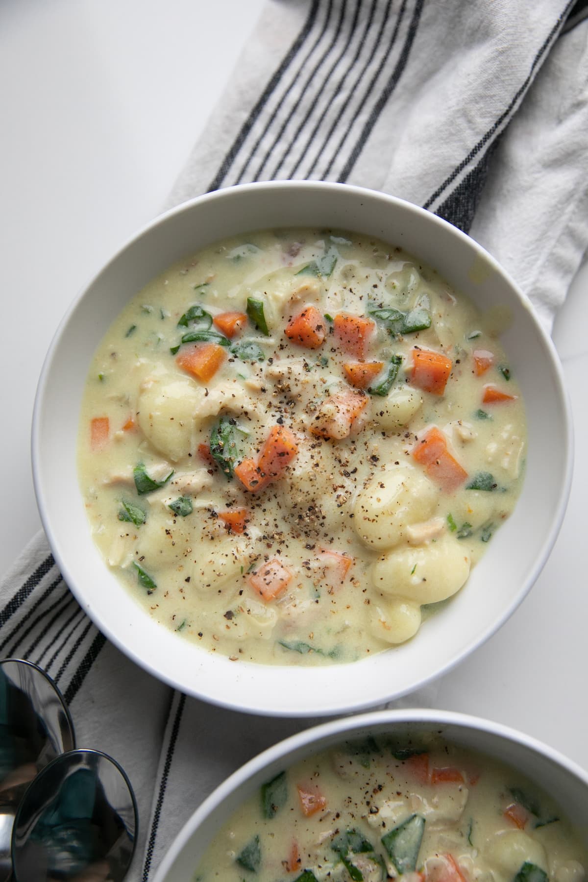 creamy chicken gnocchi soup in bowl