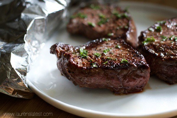 cooked steak on white plate
